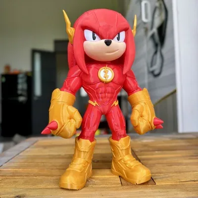 Figura colecionável vermelha com base
